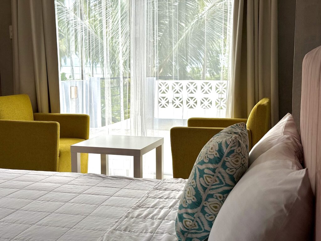 Deluxe Suite at Kahana Baler, a family room with two double beds